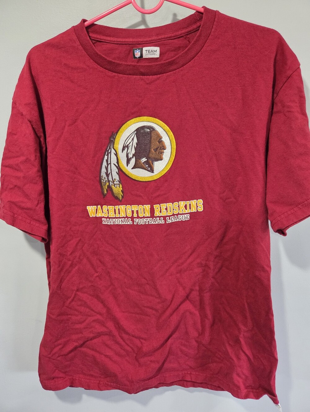 Vintage nfl washington redskins shirt largePinhole by neck as shown in photos.